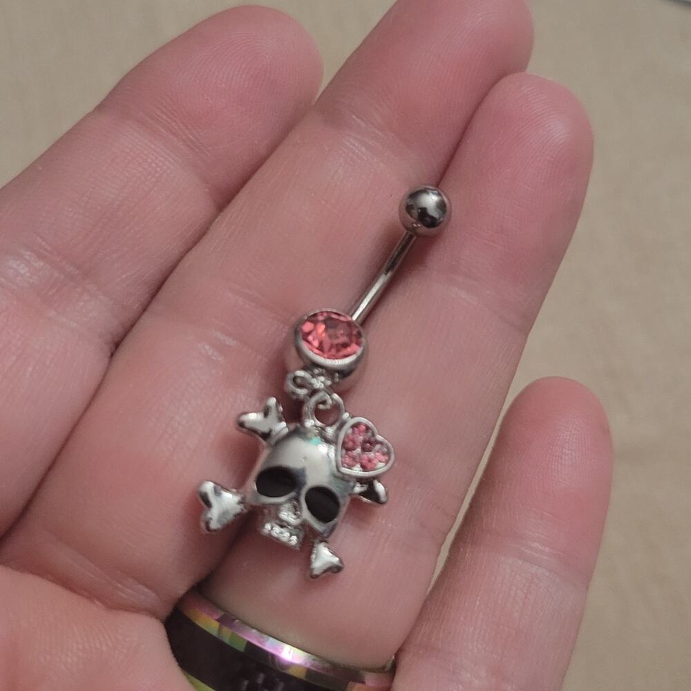 Pink & silver tone skull & crossbones crystal belly button ring